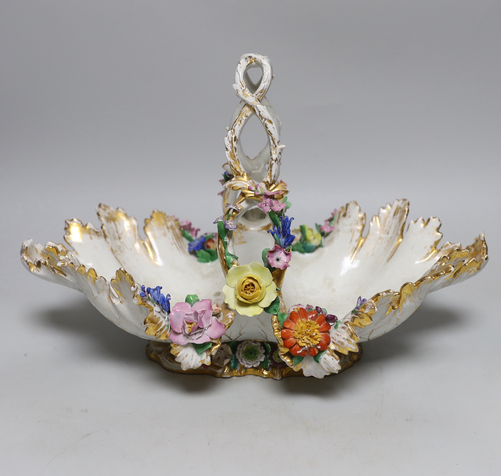 A large Meissen basket encrusted with flowers, 39cm long